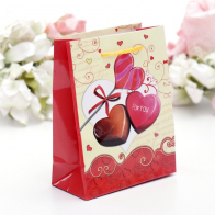 Пакет подарочный малый "Конфеты-сердечки" бумага-ламинат - фото - 1